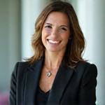 Portrait of Jane Doe, a professional woman with a warm smile