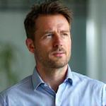 Portrait of John Smith, a focused financial professional